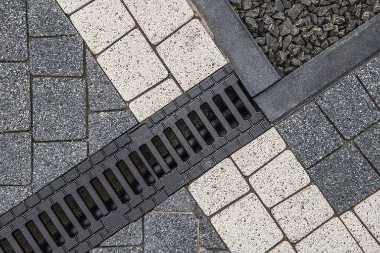 brick-driveway-and-water-drain-2025-03-16-06-57-58-utc